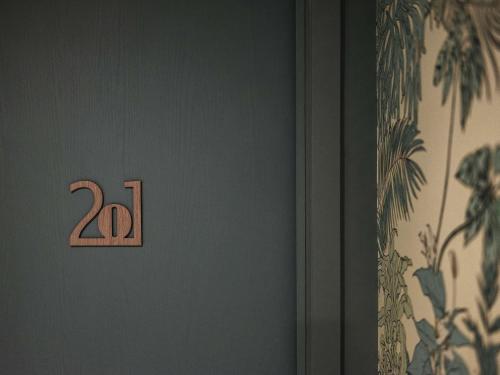 Habitación Doble Estándar con sofá cama del hotel Ibis Styles Montmartre Nord. Foto 9