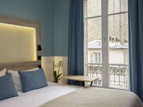 Suite Estándar del hotel Ibis Styles Montmartre Nord. Foto 10