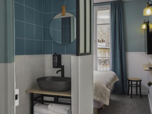 Suite Estándar del hotel Ibis Styles Montmartre Nord. Foto 11
