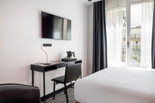 Habitación Doble Clásica del hotel Félicien By Elegancia. Foto 3