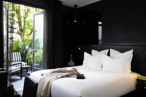 Habitación Doble Superior con terraza del hotel Félicien By Elegancia. Foto 3