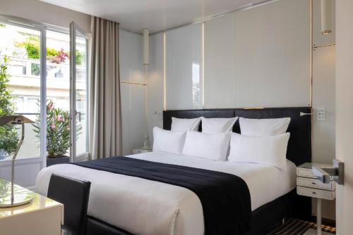 Suite con terraza del hotel Félicien By Elegancia. Foto 1