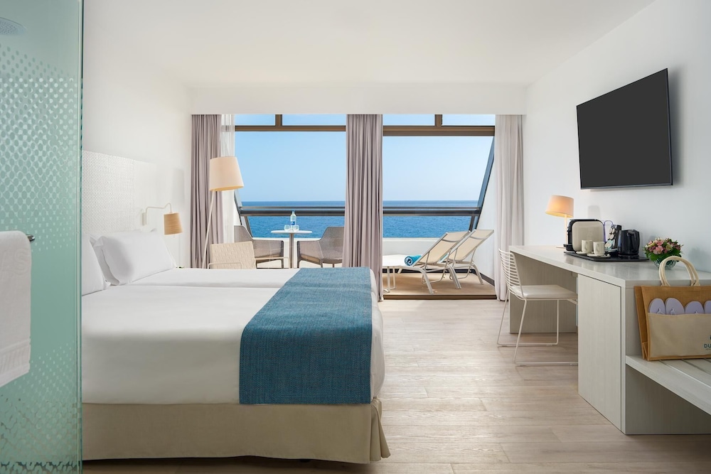 Habitación doble Vista Mar Premium Planta Alta Frente Playa 1 Cama Individual 1 Cama doble del hotel Don Gregory By Dunas, Adults Only. Foto 1