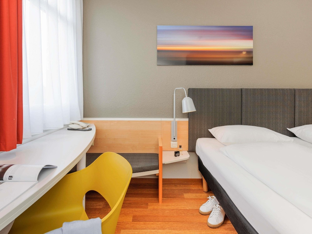 Habitación estándar con dos camas individuales del hotel Ibis Frankfurt Messe West