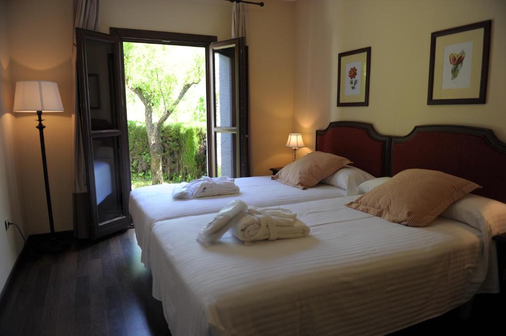 Habitación doble del hotel Villa Turistica De Bubion. Foto 1