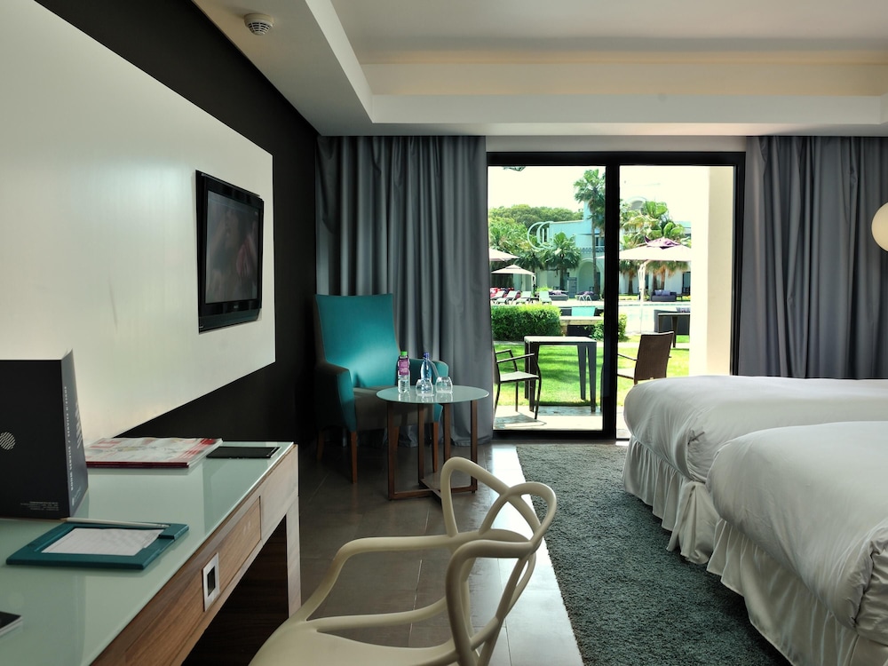HABITACIÓN PREMIUM, 2 camas individuales, vista a la piscina del hotel Pullman Mazagan Royal Golf And Spa. Foto 3