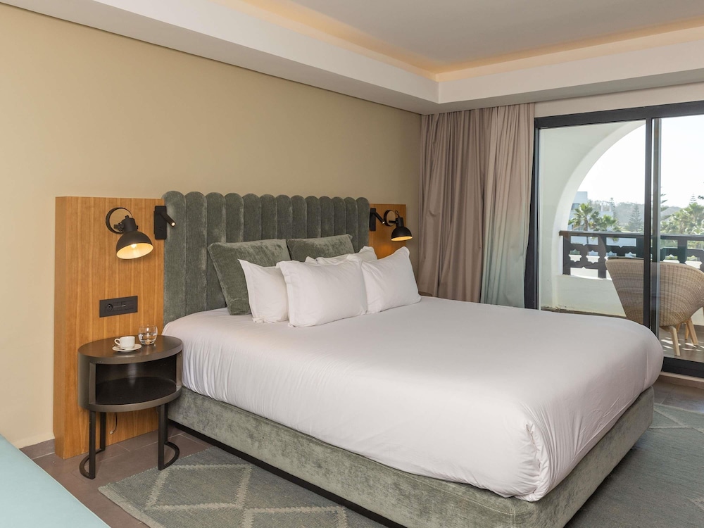 HABITACIÓN SUPERIOR PREMIUM, 1 Cama King - Size, Vista a la Piscina del hotel Pullman Mazagan Royal Golf And Spa. Foto 4
