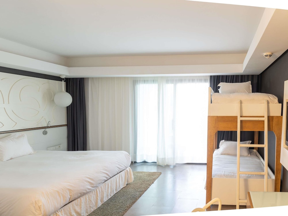 HABITACIÓN FAMILIAR, 1 Cama King Size, 2 Camas Literas del hotel Pullman Mazagan Royal Golf And Spa. Foto 5