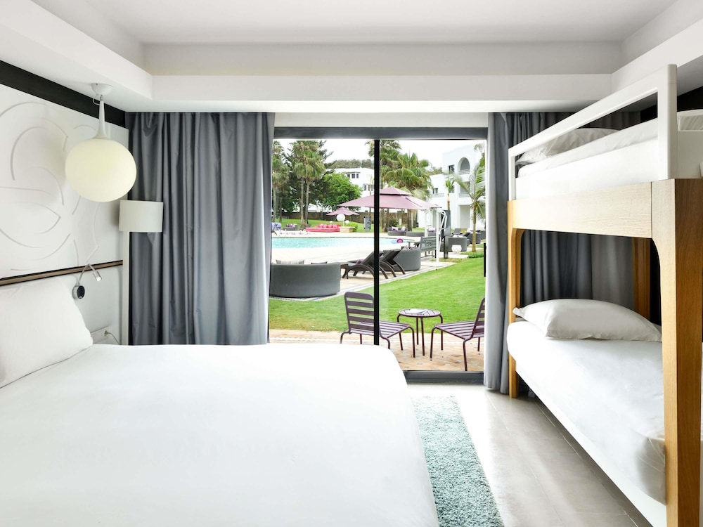 HABITACIÓN FAMILIAR, 1 Cama King Size, 2 Camas Literas del hotel Pullman Mazagan Royal Golf And Spa. Foto 7