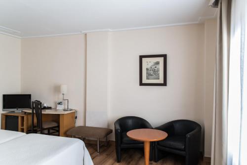 Habitación Doble Superior - 2 camas, con vistas a la ciudad del hotel Inglaterra. Foto 1