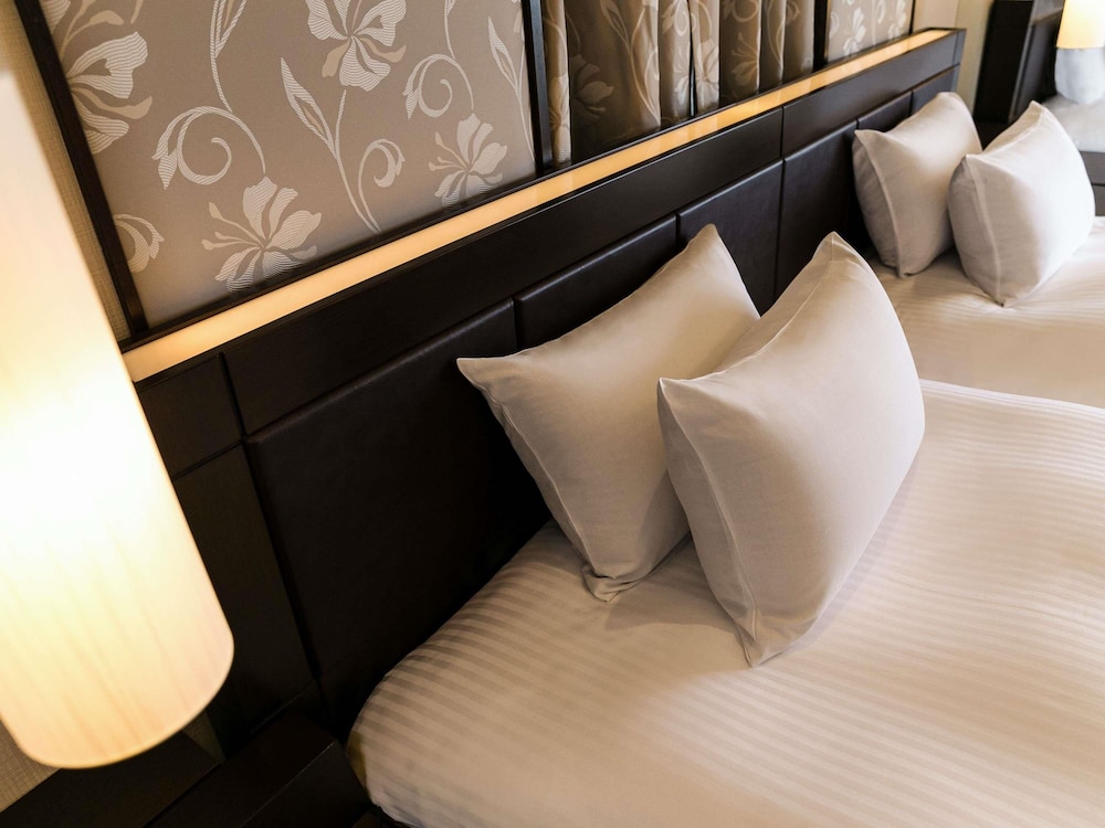 Suite Ejecutiva, estilo japonés - occidental con 2 camas individuales, vistas al mar del hotel Grand Mercure Okinawa Cape Zanpa Resort. Foto 5