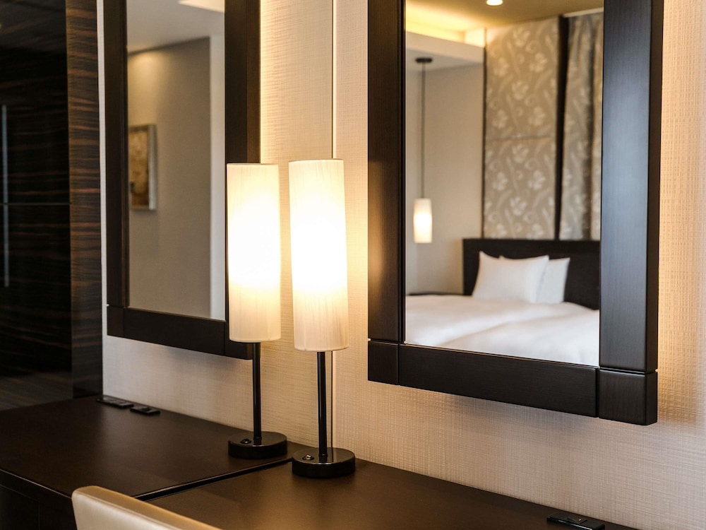 Suite Ejecutiva, estilo japonés - occidental con 2 camas individuales, vistas al mar del hotel Grand Mercure Okinawa Cape Zanpa Resort. Foto 6
