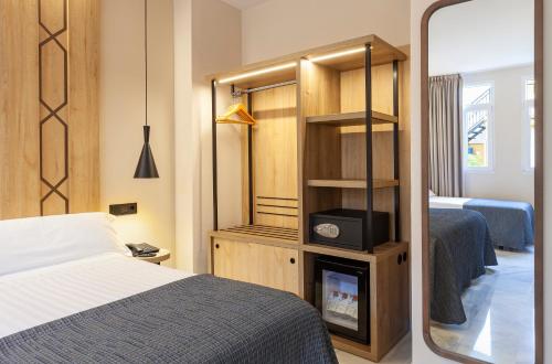 Habitación Triple del hotel Porcel Navas. Foto 7