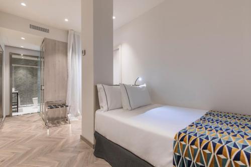 Habitación Individual del hotel Eurostars Puerta Real. Foto 1