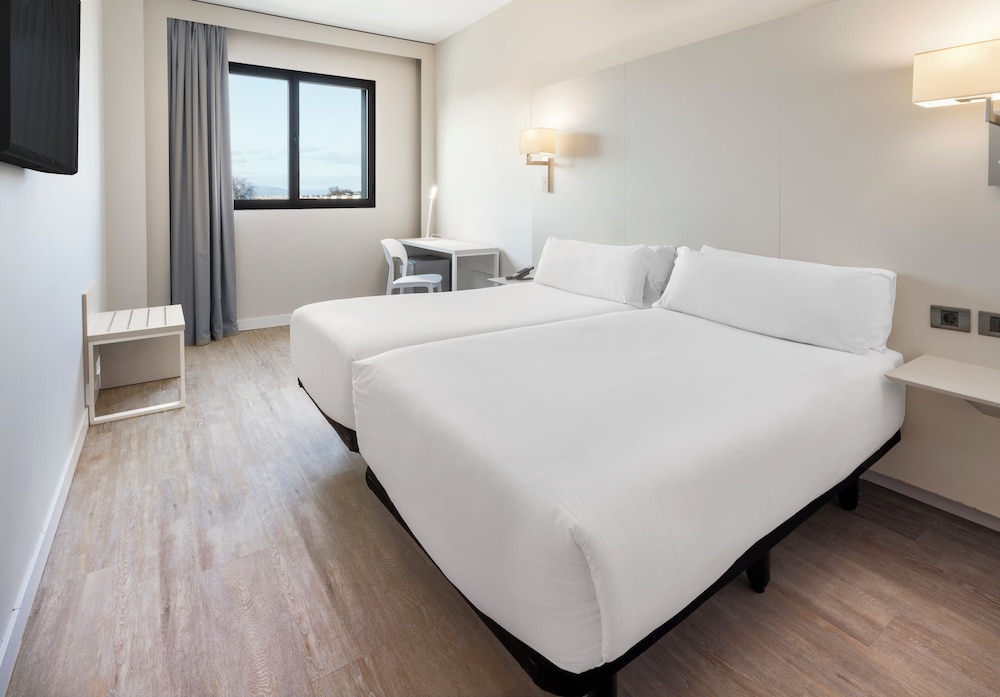 Habitación con 2 camas individuales del hotel B&B Granada Estación