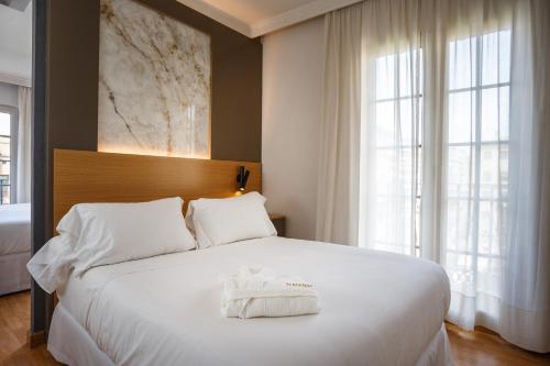 Habitación Familiar con baño privado del hotel Dauro Premier. Foto 4