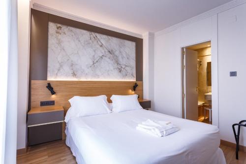 Habitación Triple del hotel Dauro Premier. Foto 8