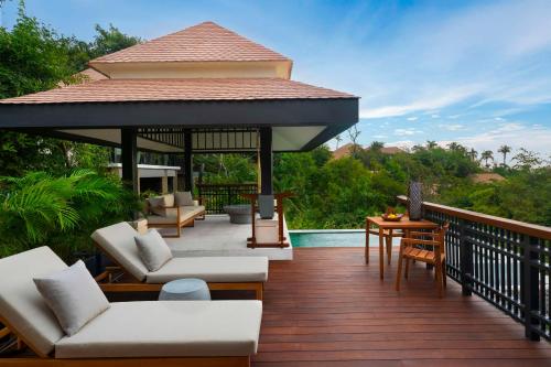 Villa con piscina junto a la ladera - Cama extragrande del hotel Banyan Tree Cabo Marques. Foto 1