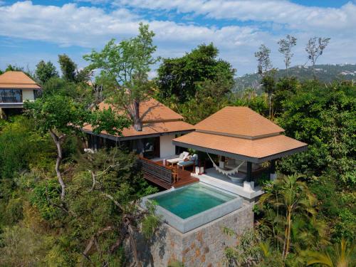 Villa con piscina junto a la ladera - Cama extragrande del hotel Banyan Tree Cabo Marques. Foto 2