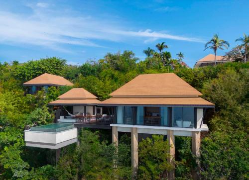 Villa con piscina y vistas al mar - Cama extragrande del hotel Banyan Tree Cabo Marques