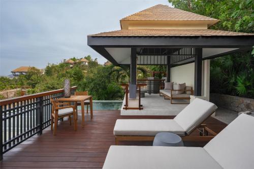 Villa con piscina y vistas al mar - Cama extragrande del hotel Banyan Tree Cabo Marques. Foto 1