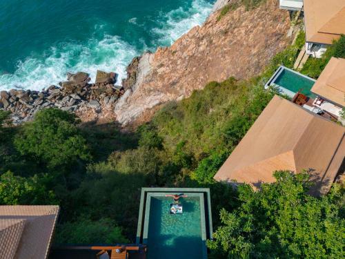 Villa con piscina frente al mar - Cama extragrande del hotel Banyan Tree Cabo Marques