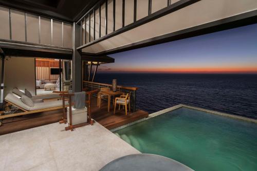 Villa con piscina frente al mar - Cama extragrande del hotel Banyan Tree Cabo Marques. Foto 2