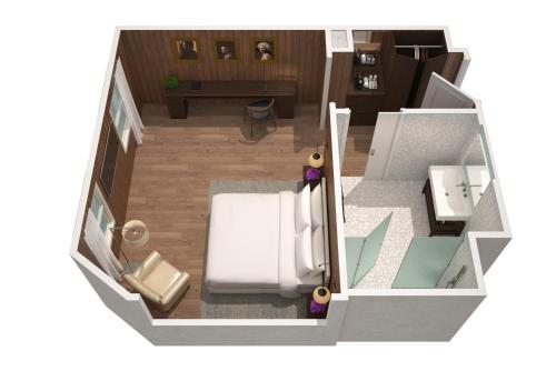 Habitación Deluxe con cama King del hotel The London Edition. Foto 1