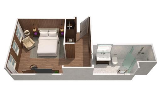 Habitación Deluxe con cama Queen del hotel The London Edition. Foto 1