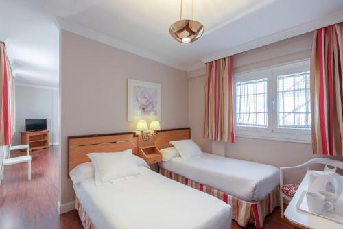 Habitación cuádruple del hotel ANACAPRI. Foto 6