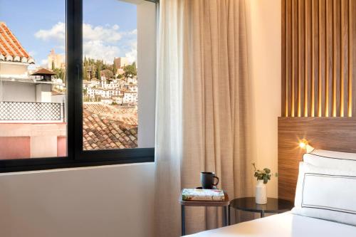 Alojamiento The Level con vistas a la Alhambra del hotel Melia Granada. Foto 9