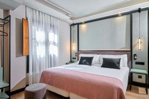 Doble Essential del hotel Boutique Hotel Luna Triunfo Granada. Foto 1