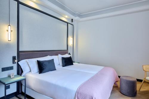 Habitación Familiar del hotel Boutique Hotel Luna Triunfo Granada. Foto 1