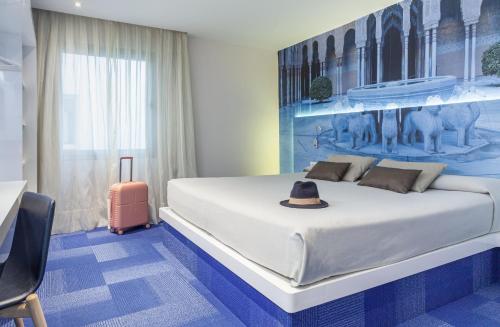 Suite Junior Familiar del hotel Macià Granada Five Senses Rooms and Suites. Foto 29