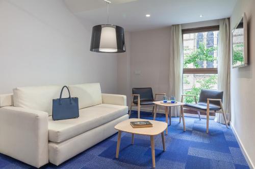 Suite Junior Familiar del hotel Macià Granada Five Senses Rooms and Suites. Foto 30