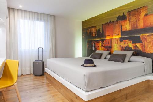 Suite Junior Familiar del hotel Macià Granada Five Senses Rooms and Suites. Foto 32