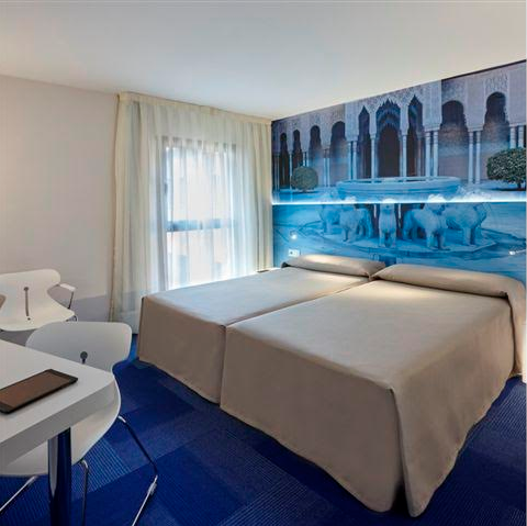 Habitación doble 2 camas del hotel Macià Granada Five Senses Rooms and Suites