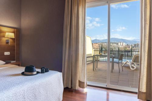 Habitación Doble Superior con terraza del hotel Macià Monasterio De Los Basilios. Foto 1