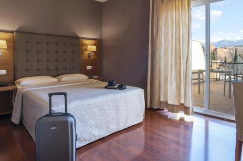 Habitación Doble Superior con terraza del hotel Macià Monasterio De Los Basilios. Foto 6