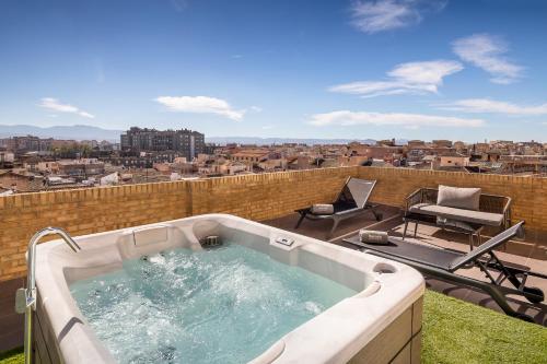 Alojamiento Deluxe con bañera de hidromasaje del hotel Barceló Carmen Granada