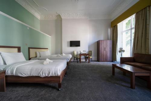 Habitación cuádruple del hotel Hyde Park Boutique. Foto 4