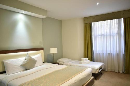 Habitación cuádruple del hotel Hyde Park Boutique. Foto 5