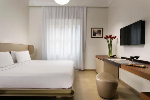 Habitación Collection del hotel Palazzo Montemartini Rome, A Radisson Collection. Foto 2