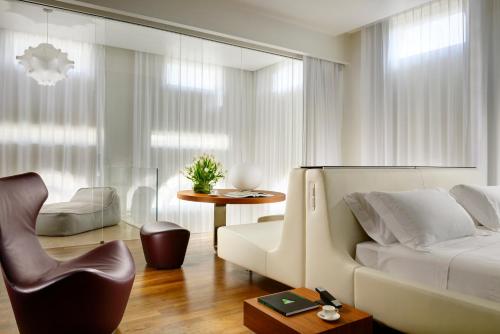 Atico del hotel Palazzo Montemartini Rome, A Radisson Collection. Foto 2