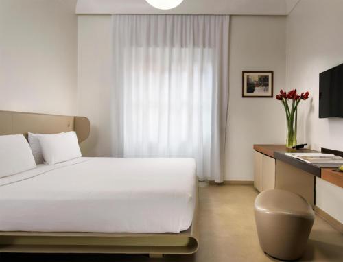 Habitación Collection del hotel Palazzo Montemartini Rome, A Radisson Collection. Foto 3
