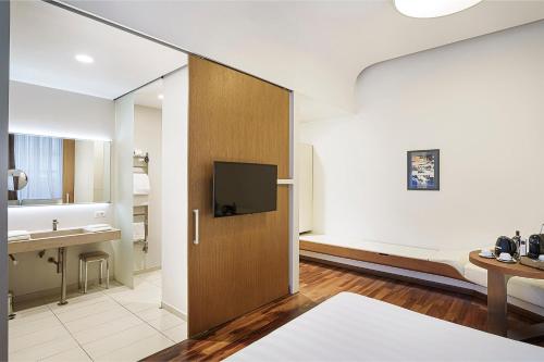 Habitación Superior Collection del hotel Palazzo Montemartini Rome, A Radisson Collection. Foto 6