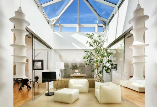 Suite Skylight del hotel Palazzo Montemartini Rome, A Radisson Collection. Foto 1