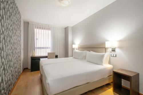 Habitación Triple del hotel Exe Convention Plaza Madrid. Foto 6