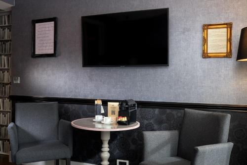 Habitación Doble Clásica con balcón o terraza del hotel Les Plumes. Foto 4