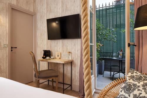 Habitación Doble Clásica con balcón o terraza del hotel Les Plumes. Foto 6